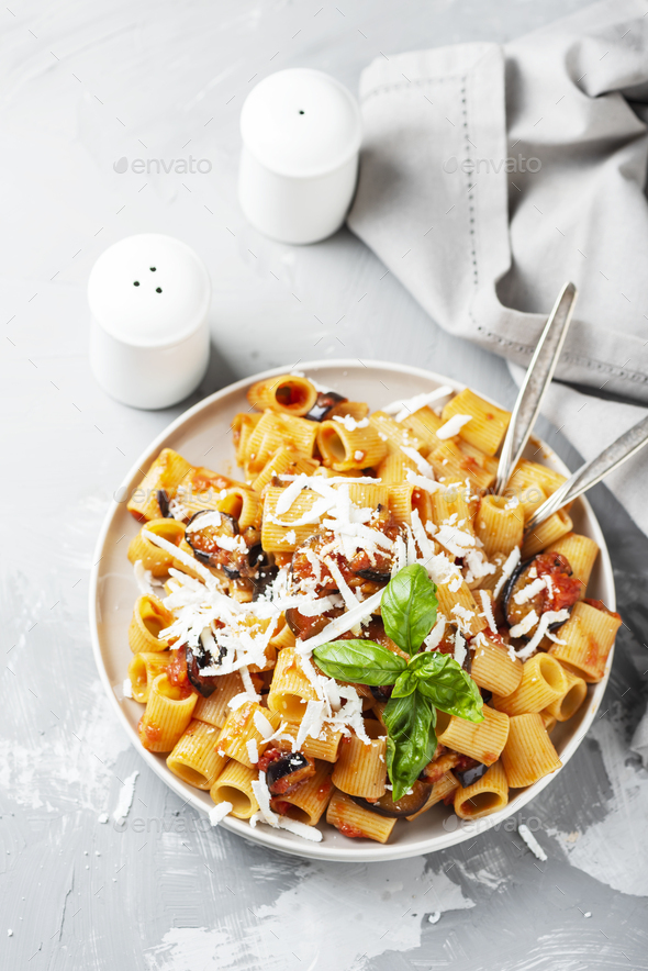 Traditional Italian dish pasta alla norma Stock Photo by OxanaDenezhkina